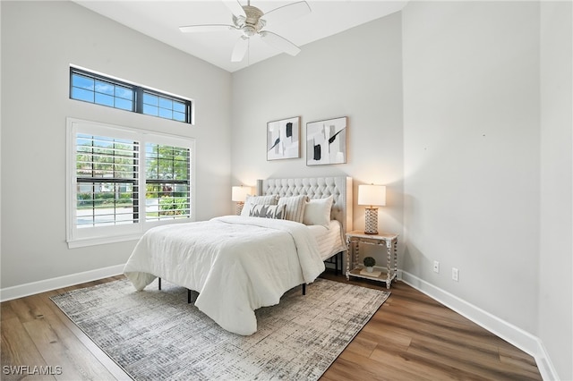 8836 Savona Ct, Naples, FL 34119 - bedroom featuring wood finished floors and ceiling fan