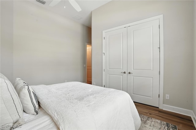 8836 Savona Ct, Naples, FL 34119 - bedroom featuring light wood finished floors, a closet, and ceiling fan