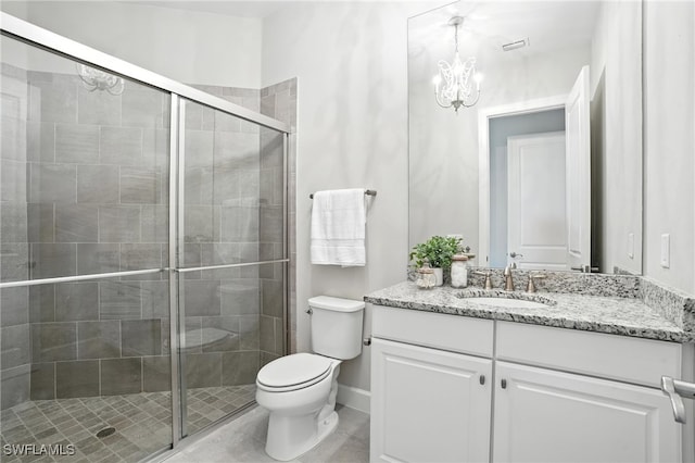 8836 Savona Ct, Naples, FL 34119 - bathroom featuring a chandelier, vanity, a shower stall, and tile patterned floors