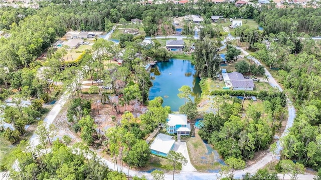 20433 Fern Cir, North Fort Myers, FL 33917 - aerial view of property and surrounding area with a large body of water and nearby suburban area