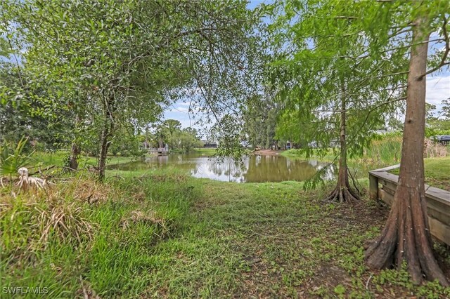 20433 Fern Cir, North Fort Myers, FL 33917 - view of yard with a water view