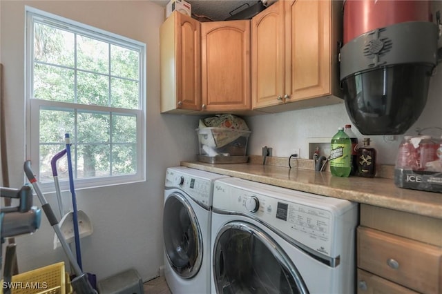 20433 Fern Cir, North Fort Myers, FL 33917 - laundry room featuring cabinet space and independent washer and dryer