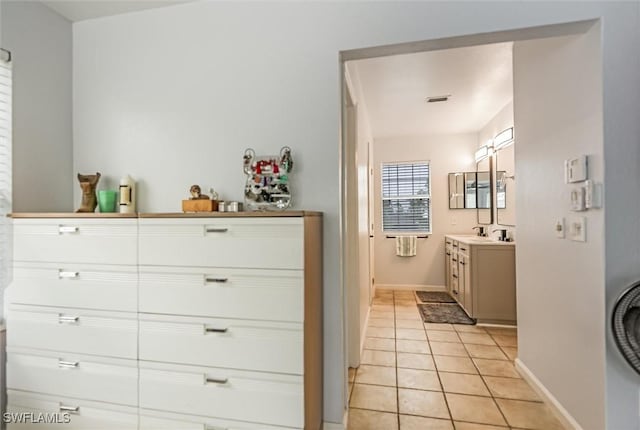 20433 Fern Cir, North Fort Myers, FL 33917 - full bathroom featuring vanity and tile patterned flooring