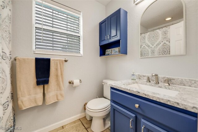 20433 Fern Cir, North Fort Myers, FL 33917 - full bathroom featuring vanity and tile patterned floors