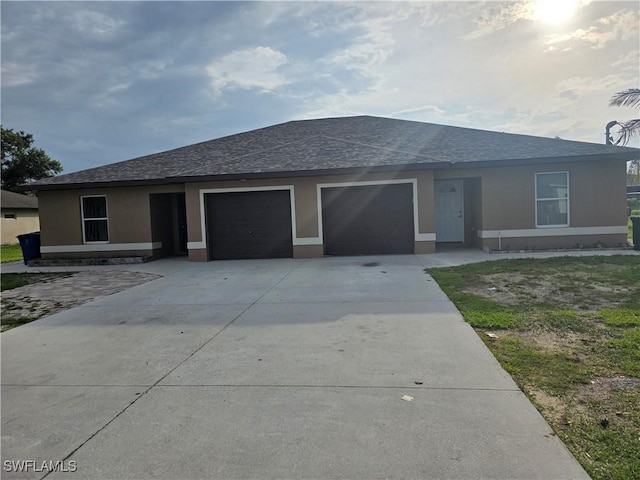 328 Harold Ave S, Lehigh Acres, FL 33973 - single story home featuring a garage, driveway, roof with shingles, and stucco siding