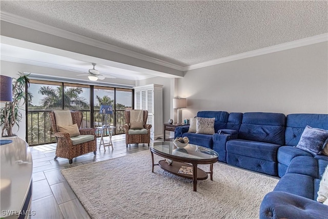 7430 Lake Breeze Dr Unit 403, Fort Myers, FL 33907 - living area featuring crown molding, a ceiling fan, and a textured ceiling