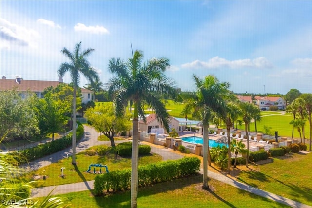 7430 Lake Breeze Dr Unit 403, Fort Myers, FL 33907 - surrounding community featuring a lawn