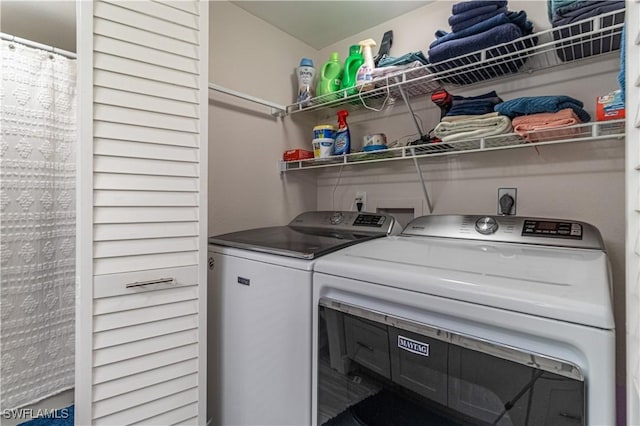 7430 Lake Breeze Dr Unit 403, Fort Myers, FL 33907 - washroom featuring washing machine and dryer