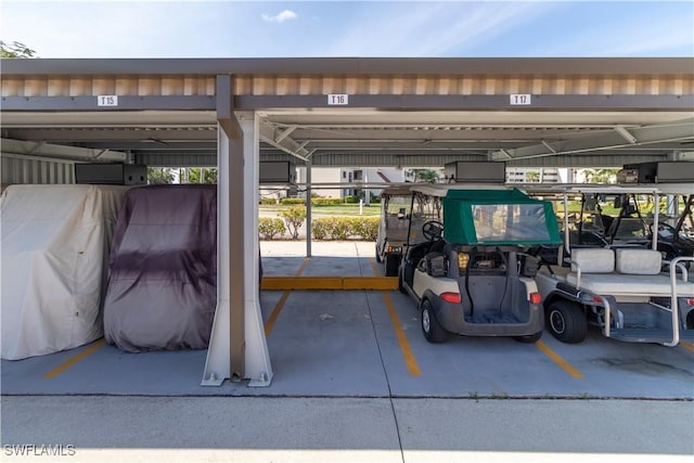 7430 Lake Breeze Dr Unit 403, Fort Myers, FL 33907 - view of covered parking lot