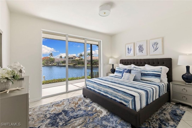 173 Gulfport Ct, Marco Island, FL 34145 - tiled bedroom with access to outside and a water view