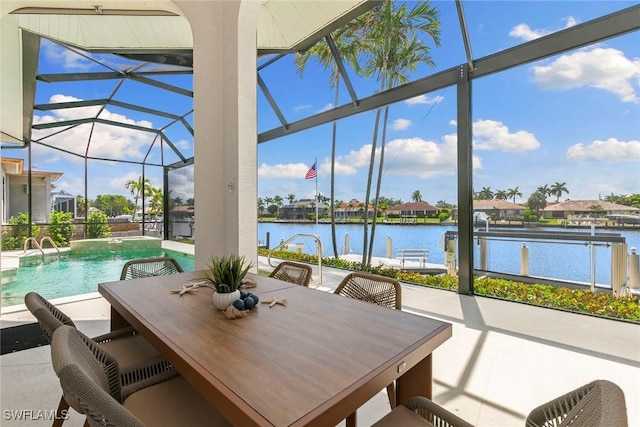 173 Gulfport Ct, Marco Island, FL 34145 - sunroom featuring a water view and outdoor dining space