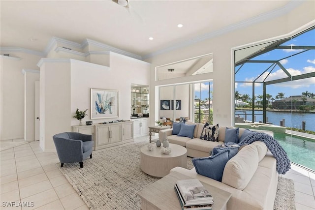 173 Gulfport Ct, Marco Island, FL 34145 - living room featuring light tile patterned floors, crown molding, a water view, recessed lighting, and a high ceiling