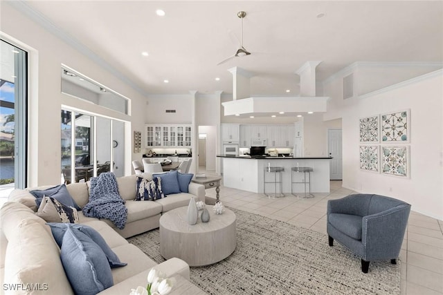 173 Gulfport Ct, Marco Island, FL 34145 - living area with ornamental molding, light tile patterned floors, recessed lighting, and a high ceiling