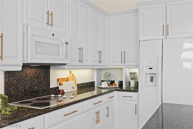 173 Gulfport Ct, Marco Island, FL 34145 - kitchen featuring white appliances, white cabinets, backsplash, and dark stone countertops
