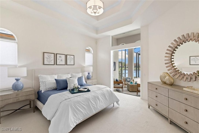 173 Gulfport Ct, Marco Island, FL 34145 - bedroom with light colored carpet, a water view, access to outside, a chandelier, and crown molding