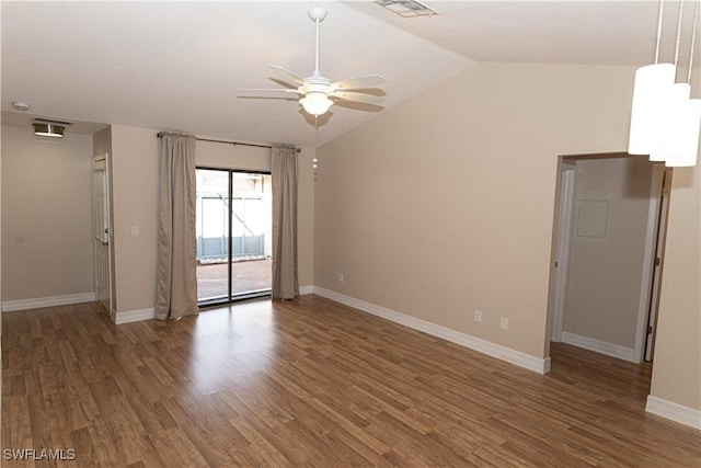 13391 Broadhurst Loop, Fort Myers, FL 33919 - spare room featuring a ceiling fan, wood finished floors, baseboards, and vaulted ceiling