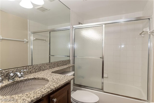 13391 Broadhurst Loop, Fort Myers, FL 33919 - full bathroom with toilet, vanity, and combined bath / shower with glass door