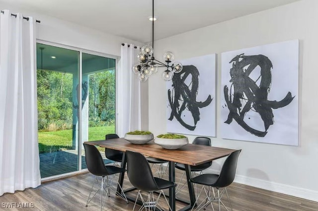 16935 Sage Ter, Punta Gorda, FL 33982 - dining room featuring wood finished floors and baseboards