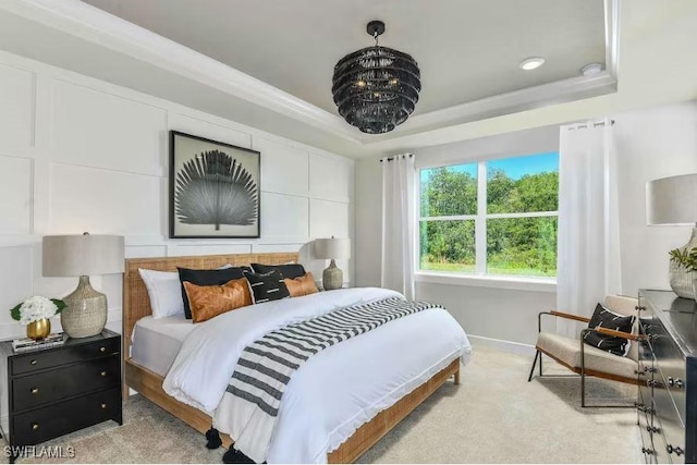 16935 Sage Ter, Punta Gorda, FL 33982 - bedroom featuring light carpet, baseboards, and a tray ceiling