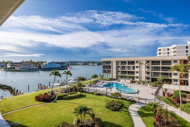 3200 Gulf Shore Blvd N Unit 403, Naples, FL 34103 - community pool with a water view, a patio area, and a lawn