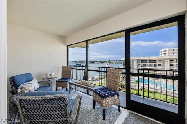 3200 Gulf Shore Blvd N Unit 403, Naples, FL 34103 - sunroom / solarium with a water view