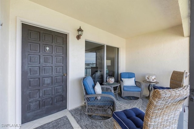 3200 Gulf Shore Blvd N Unit 403, Naples, FL 34103 - doorway to property with stucco siding