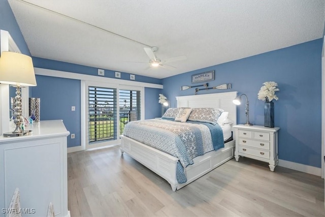 3200 Gulf Shore Blvd N Unit 403, Naples, FL 34103 - bedroom with light wood-style floors, access to exterior, and a ceiling fan
