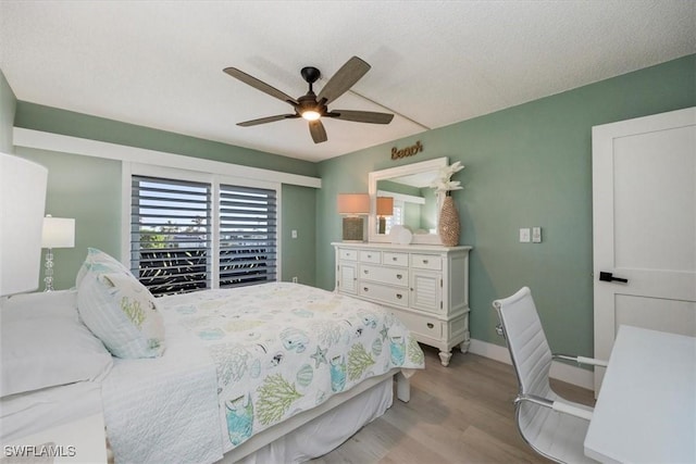 3200 Gulf Shore Blvd N Unit 403, Naples, FL 34103 - bedroom featuring wood finished floors and ceiling fan