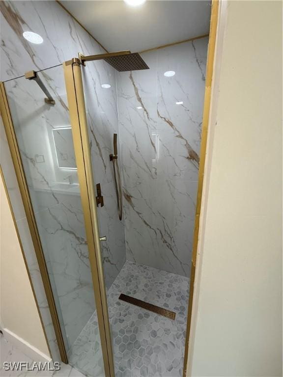 2803 E 5th St, Lehigh Acres, FL 33972 - bathroom with a marble finish shower