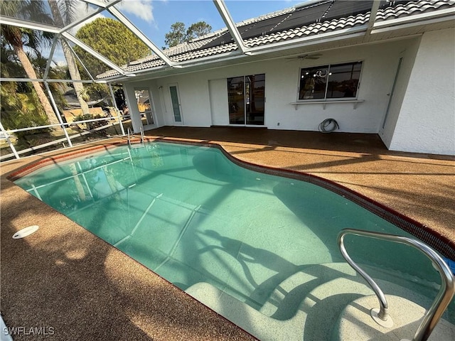 2803 E 5th St, Lehigh Acres, FL 33972 - outdoor pool featuring a patio, ceiling fan, and glass enclosure