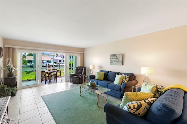 860 Panama Ct Unit 107, Marco Island, FL 34145 - living room with light tile patterned floors