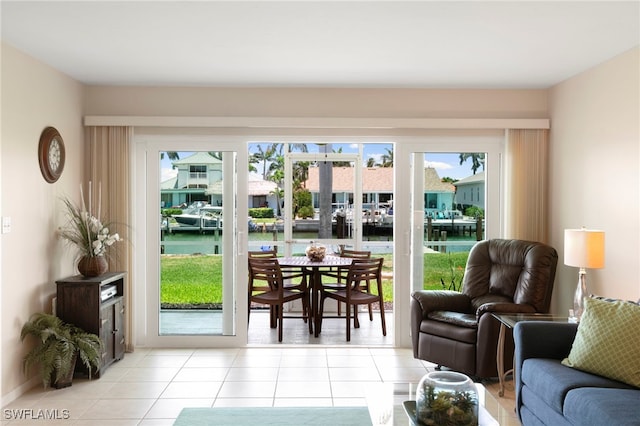 860 Panama Ct Unit 107, Marco Island, FL 34145 - entryway featuring healthy amount of natural light, tile patterned floors, and a water view