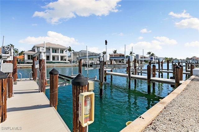 860 Panama Ct Unit 107, Marco Island, FL 34145 - dock with boat lift, a water view, and a residential view