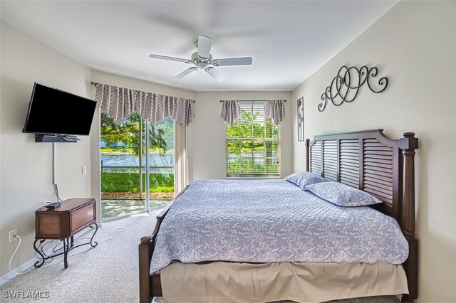 10011 Sky View Way Unit 1803, Fort Myers, FL 33913 - bedroom featuring access to exterior, carpet, a ceiling fan, and baseboards
