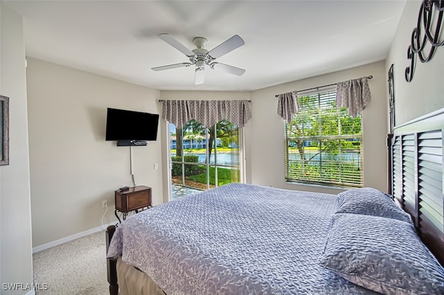 10011 Sky View Way Unit 1803, Fort Myers, FL 33913 - carpeted bedroom with access to outside, baseboards, and a ceiling fan