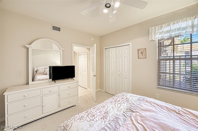 10011 Sky View Way Unit 1803, Fort Myers, FL 33913 - bedroom featuring light colored carpet, a closet, a ceiling fan, and baseboards