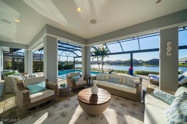 14372 Neptune Ave, Naples, FL 34114 - view of patio / terrace featuring an outdoor living space, a water view, an outdoor pool, and glass enclosure