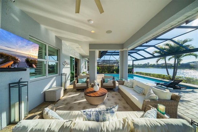 14372 Neptune Ave, Naples, FL 34114 - view of patio featuring an outdoor living space, a water view, an outdoor pool, ceiling fan, and a lanai