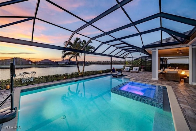 14372 Neptune Ave, Naples, FL 34114 - view of swimming pool featuring a water view, a pool with connected hot tub, a patio, an outdoor living space, and ceiling fan