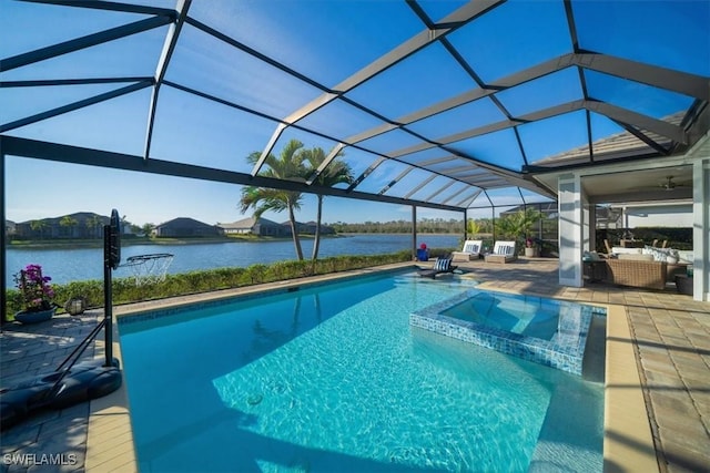 14372 Neptune Ave, Naples, FL 34114 - view of pool featuring outdoor lounge area, a patio area, a water view, and a pool with connected hot tub