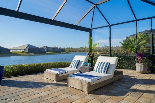 14372 Neptune Ave, Naples, FL 34114 - view of patio / terrace featuring a water view and a lanai