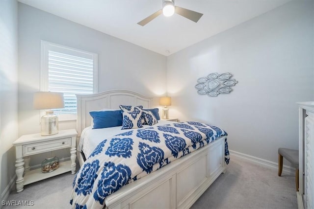 14372 Neptune Ave, Naples, FL 34114 - bedroom featuring light carpet, baseboards, and ceiling fan