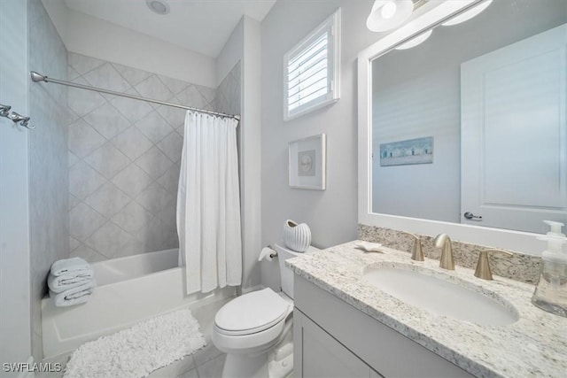 14372 Neptune Ave, Naples, FL 34114 - full bath with vanity, toilet, shower / tub combo, and tile patterned flooring