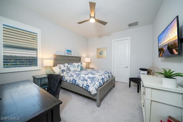14372 Neptune Ave, Naples, FL 34114 - bedroom with light colored carpet and ceiling fan