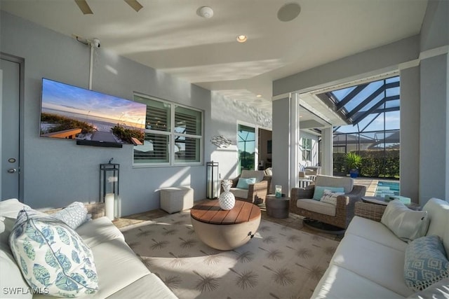 14372 Neptune Ave, Naples, FL 34114 - living room featuring a sunroom and a ceiling fan