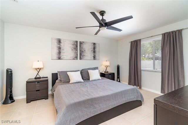2310 SW 17th St, Cape Coral, FL 33991 - bedroom featuring light tile patterned floors, baseboards, and a ceiling fan