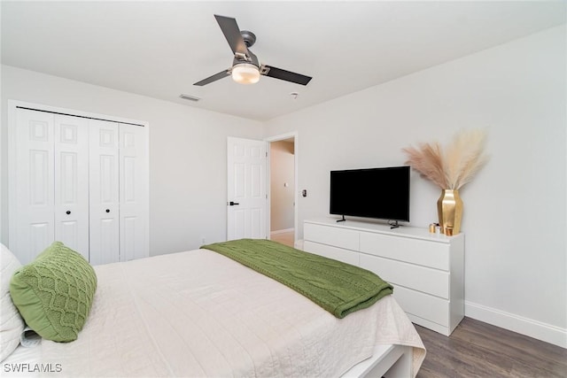 2310 SW 17th St, Cape Coral, FL 33991 - bedroom with baseboards, dark wood-type flooring, a closet, and a ceiling fan