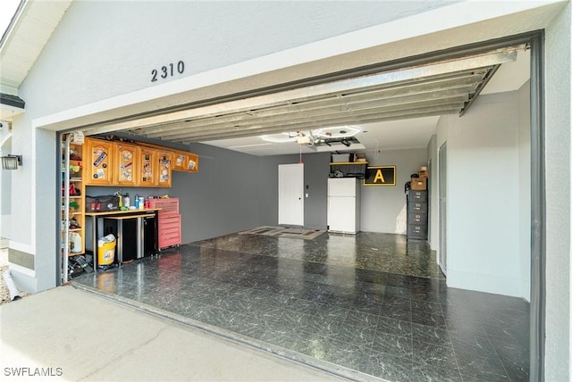 2310 SW 17th St, Cape Coral, FL 33991 - garage with freestanding refrigerator