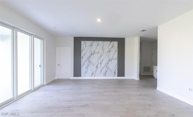 17211 Nile Ct, Punta Gorda, FL 33955 - unfurnished room featuring light wood finished floors, baseboards, and recessed lighting