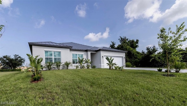 17211 Nile Ct, Punta Gorda, FL 33955 - view of front of house with a standing seam roof, a garage, stucco siding, a front lawn, and driveway